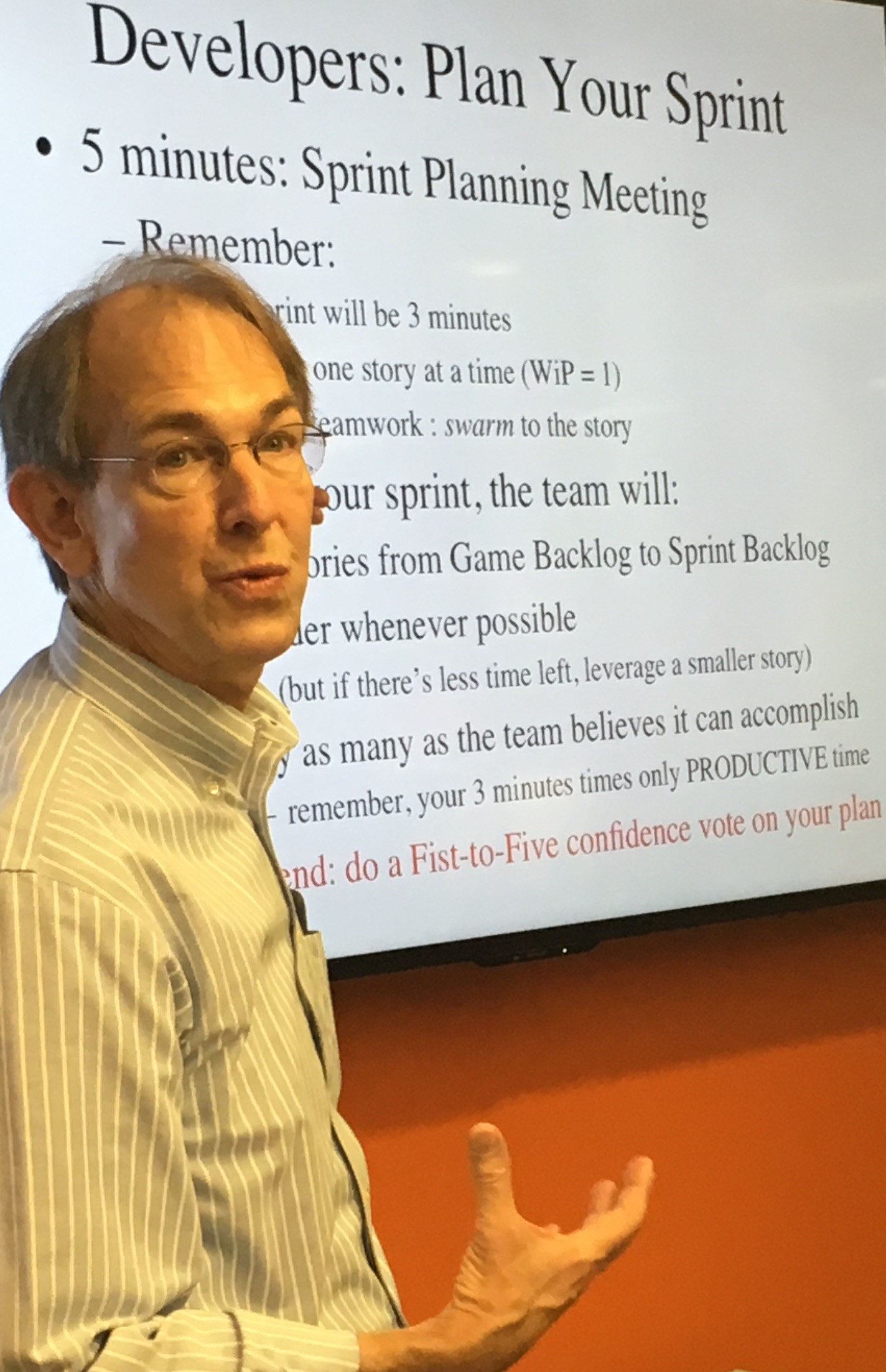 Ron Lichty explaining developer responsibilities in class.